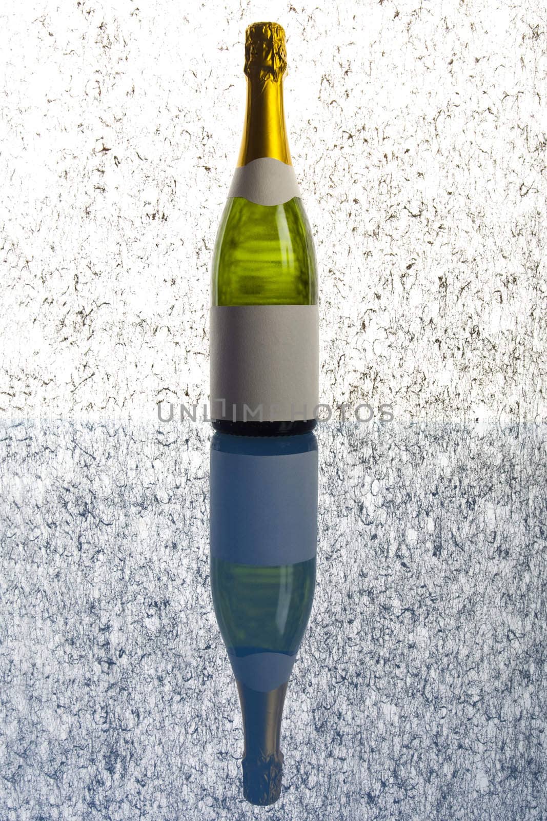 Bottle of champagne on background