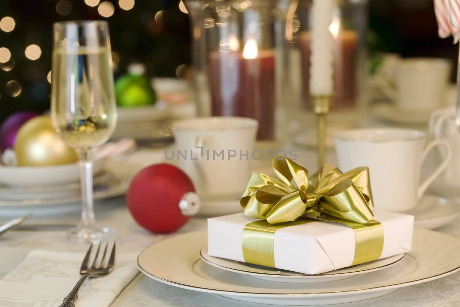 Gold ribbon gift on table