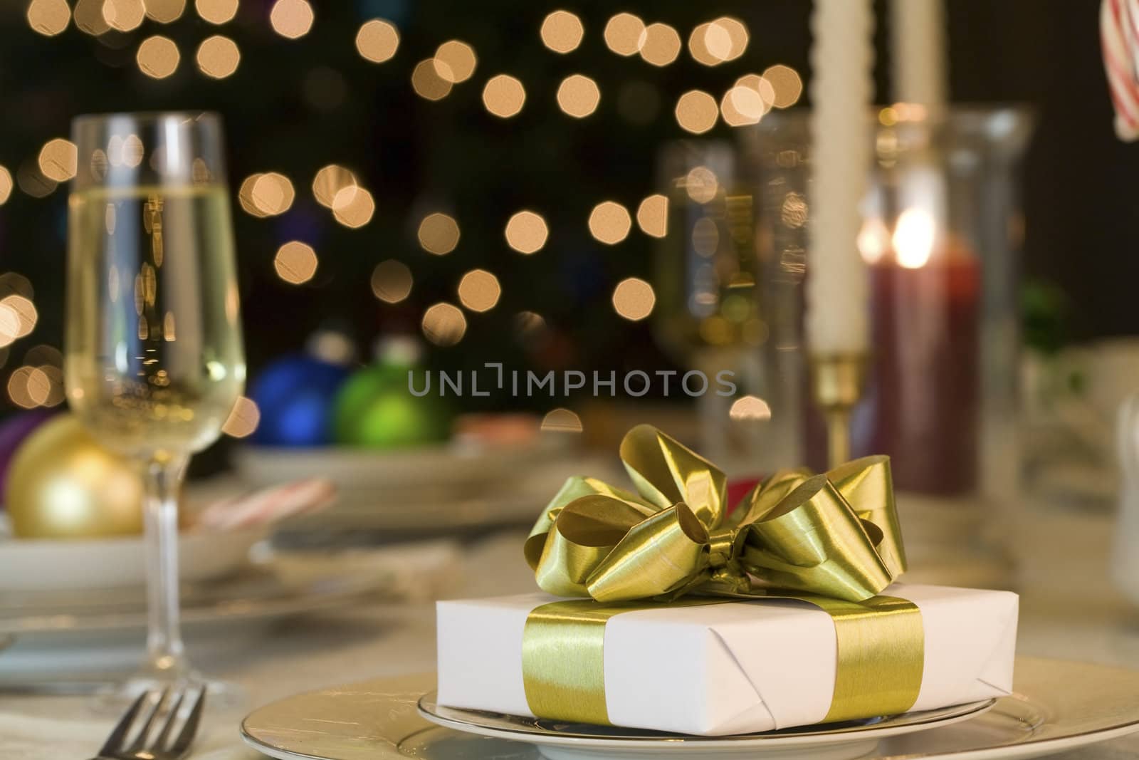 Gold ribbon gift on table