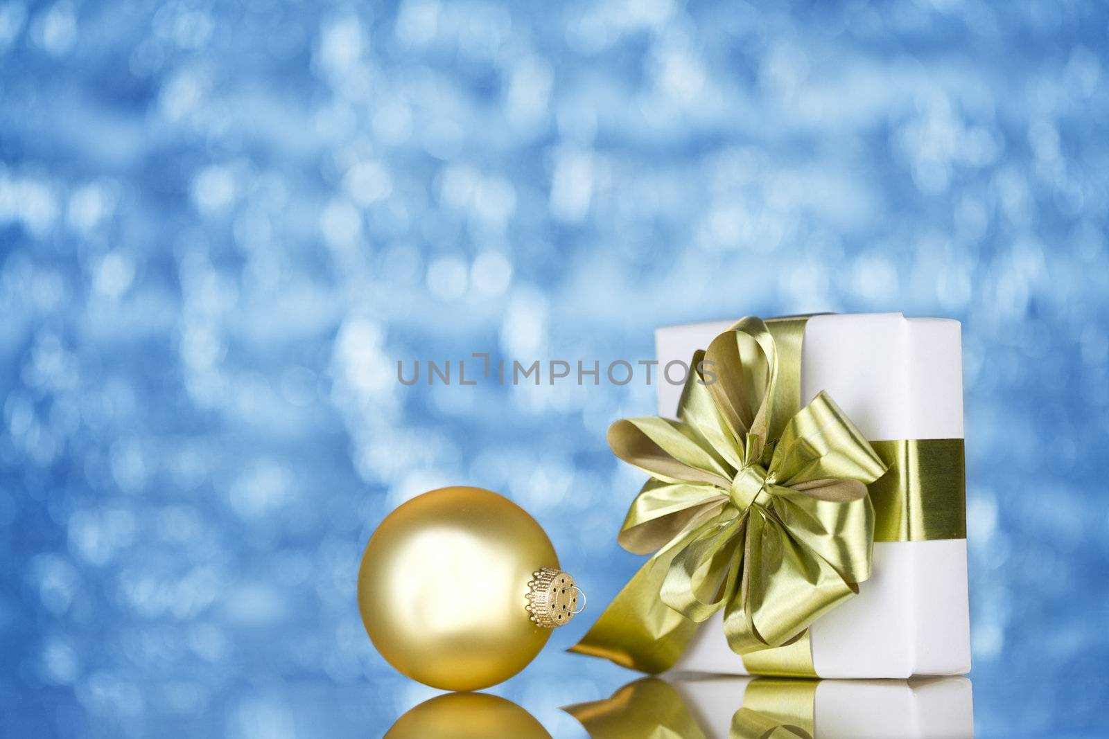 Gold present and ornament by jarenwicklund