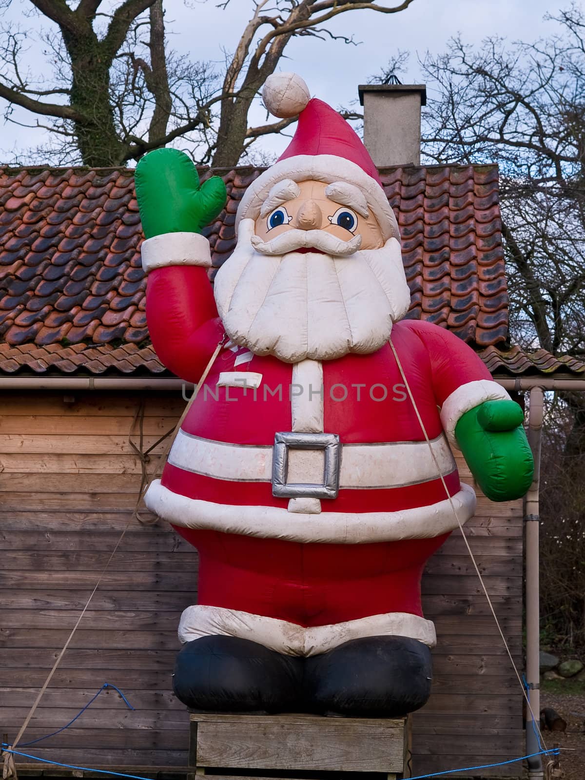 Christmas theme traditional happy greeting Santa Claus doll vertical