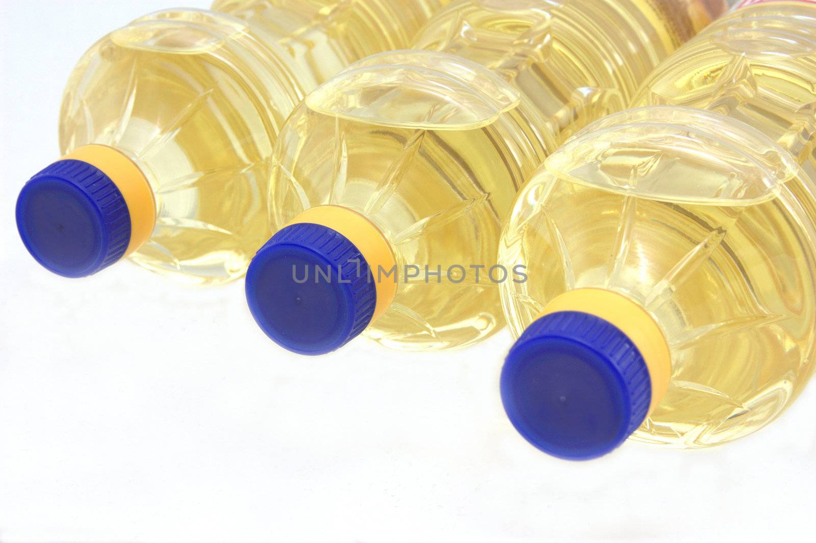 sunflowers oil into bottles isolated