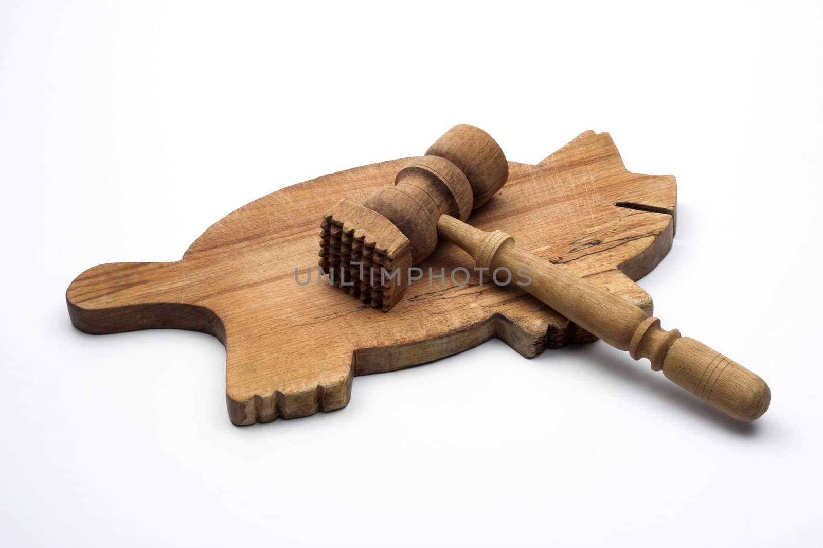  Wooden meat hammer and board on white background