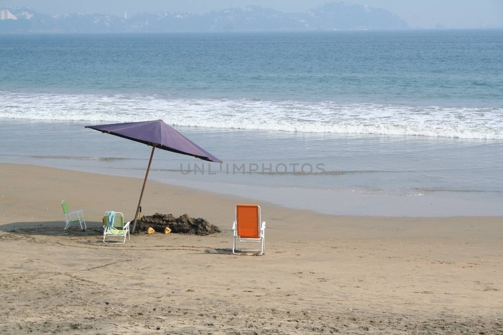 umbrella and chairs on beach