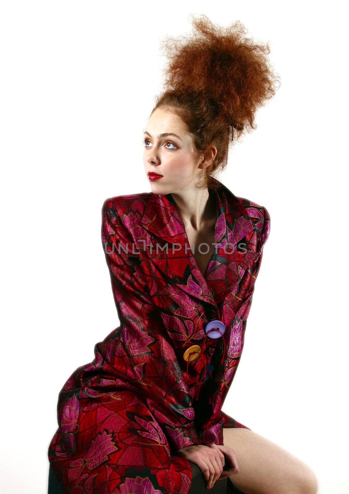 Portrait of the young girl on a white background
