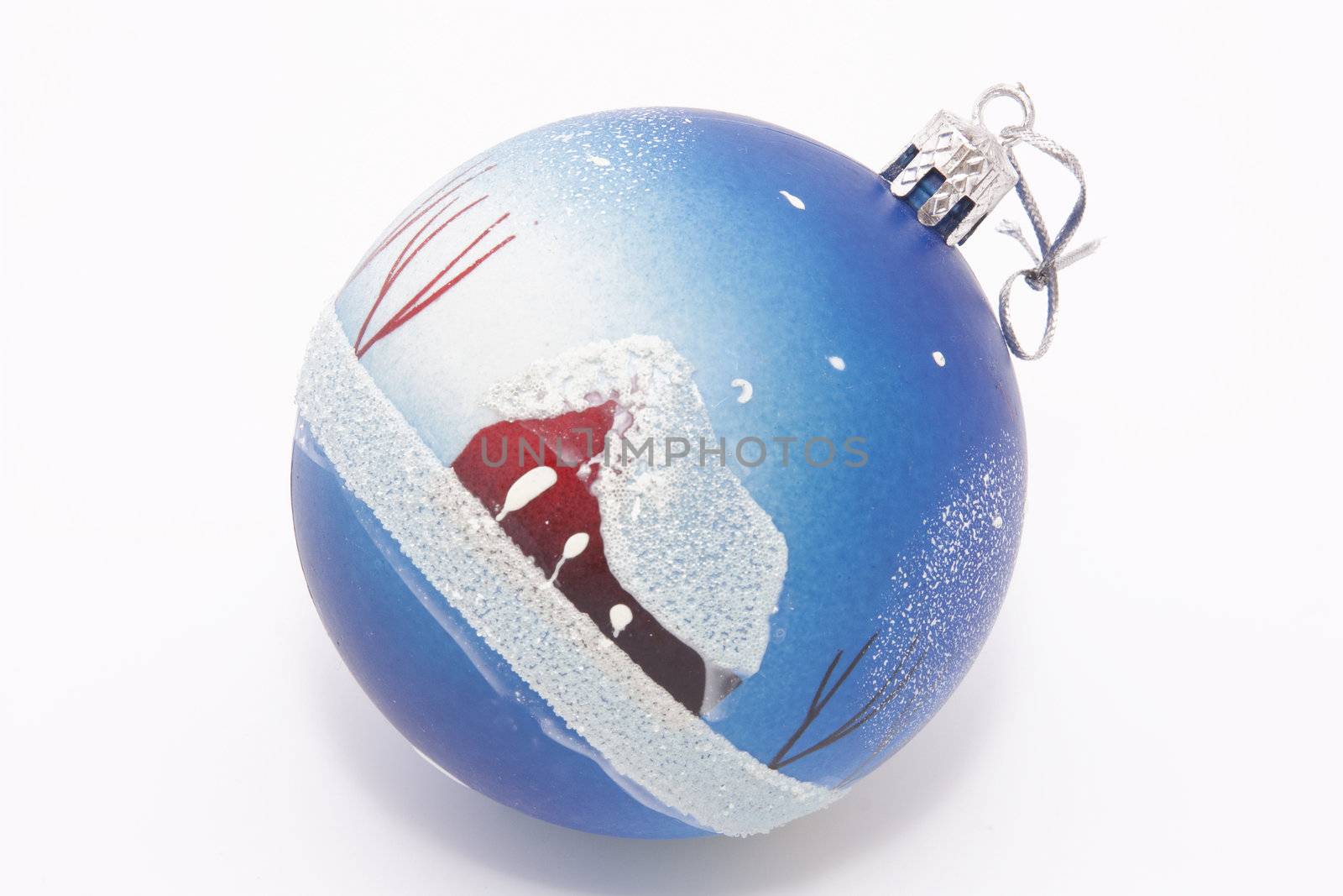 Fur-tree toy - a sphere with house drawing on the white background