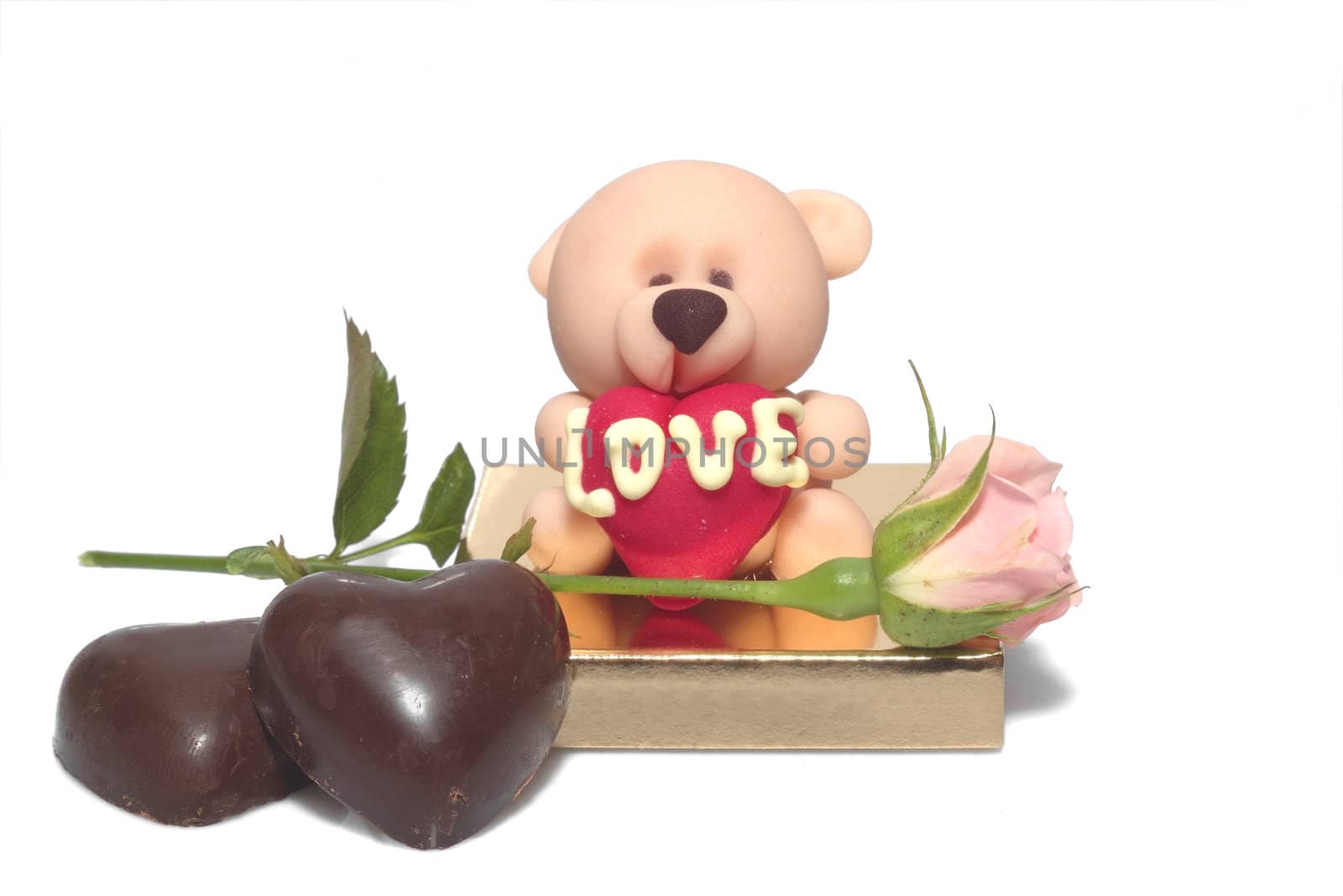 valentines day background - rose and two chocolate hearts and sugar bear