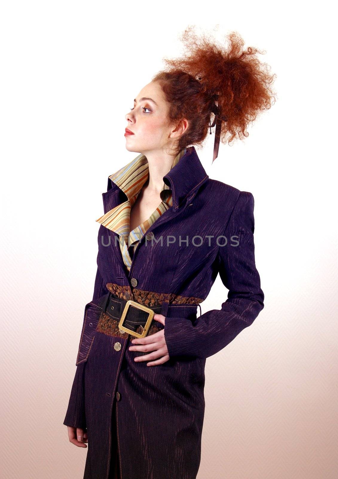 The beautiful girl in a coat