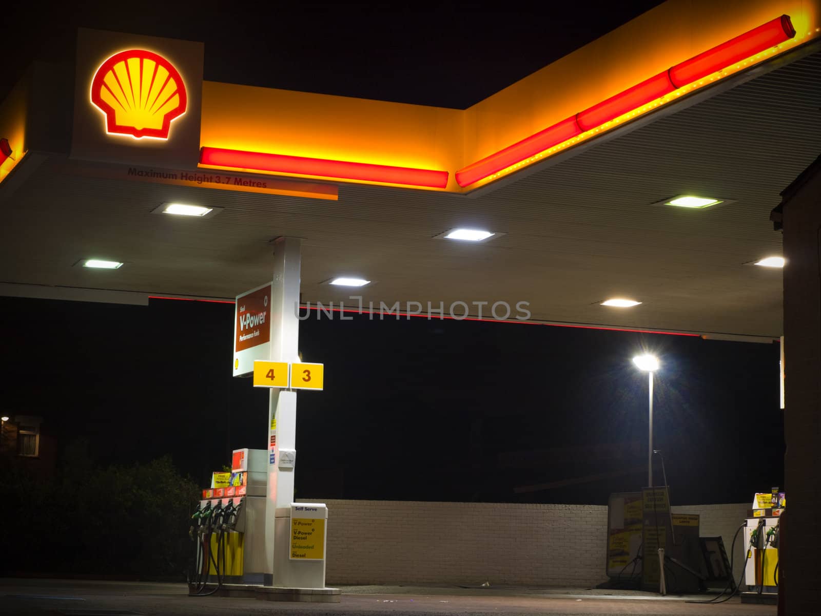 Shell Petrol Gas Station Forecourt at Night For Editorial Use Only