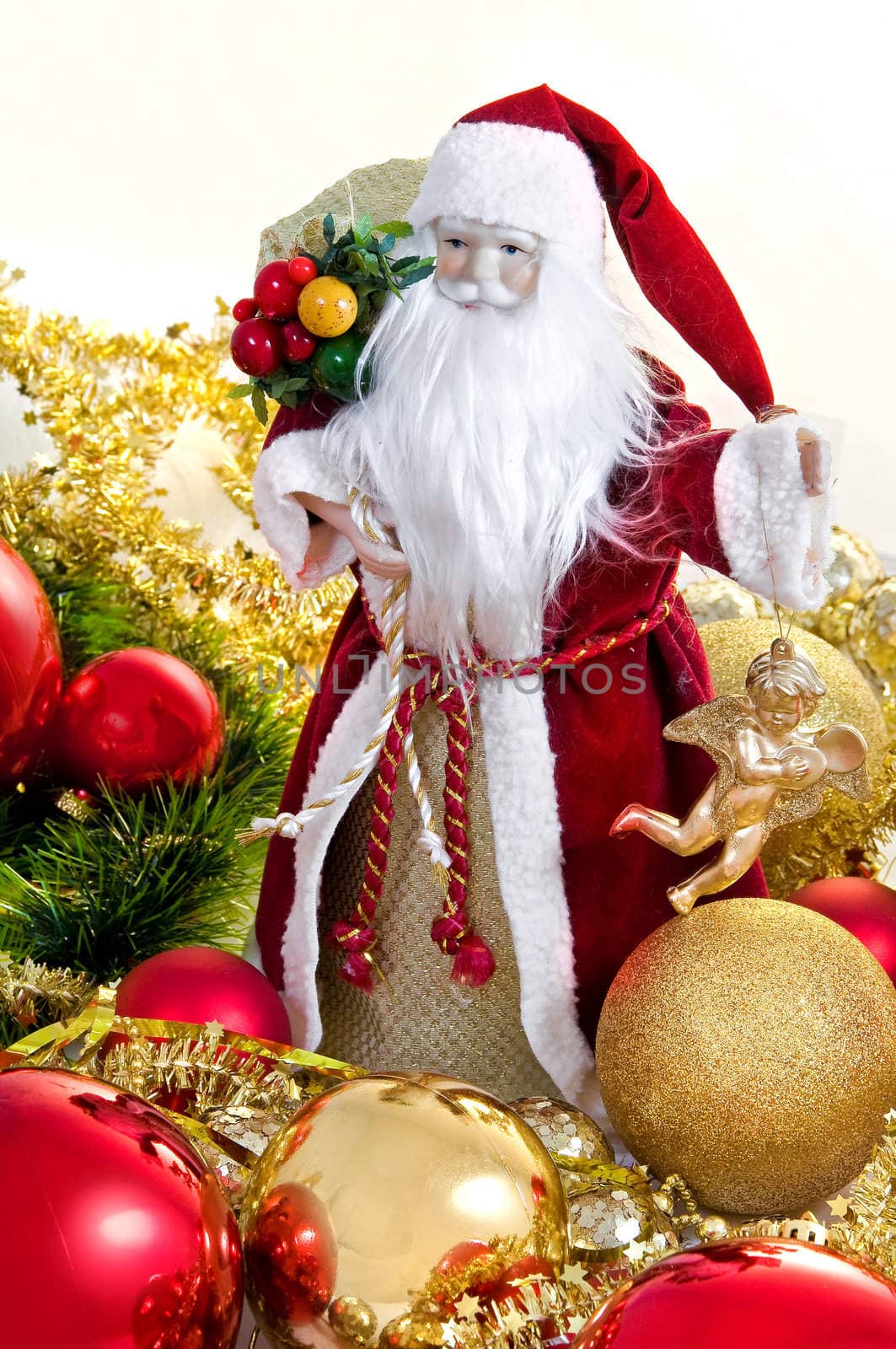 Happy Christmas toy Santa. It is isolated above a white background