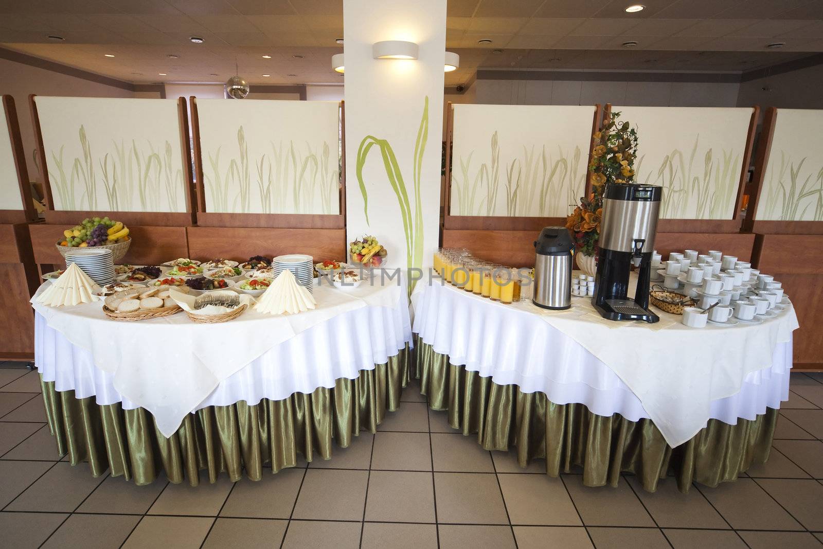 table full of salads, bread and coffee