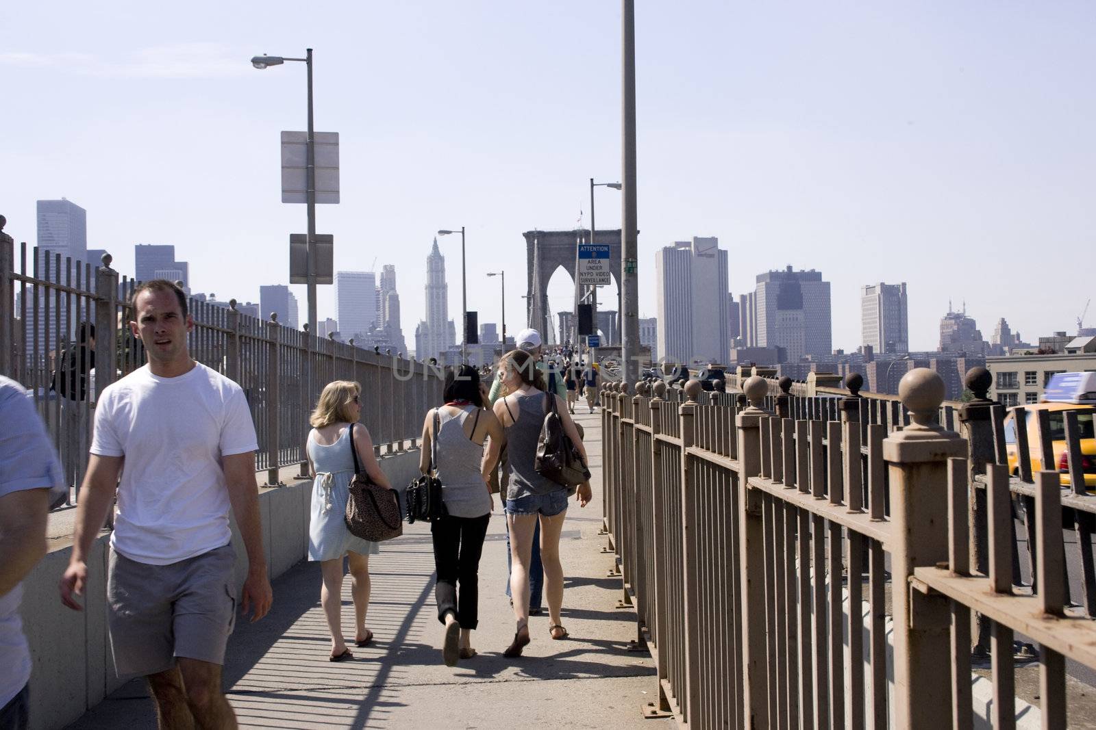 Crossing the Brooklyn Bridge by patballard