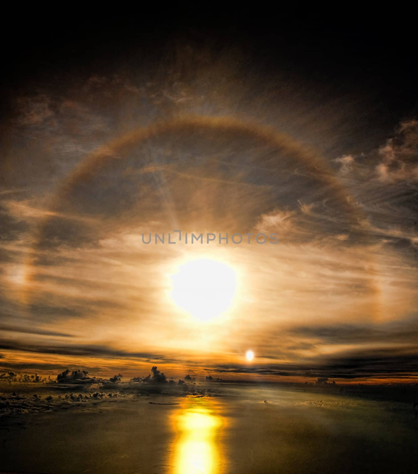 Image taken high in the atmosphere above the Florida Keys of the sky and setting sun producing a surreal image