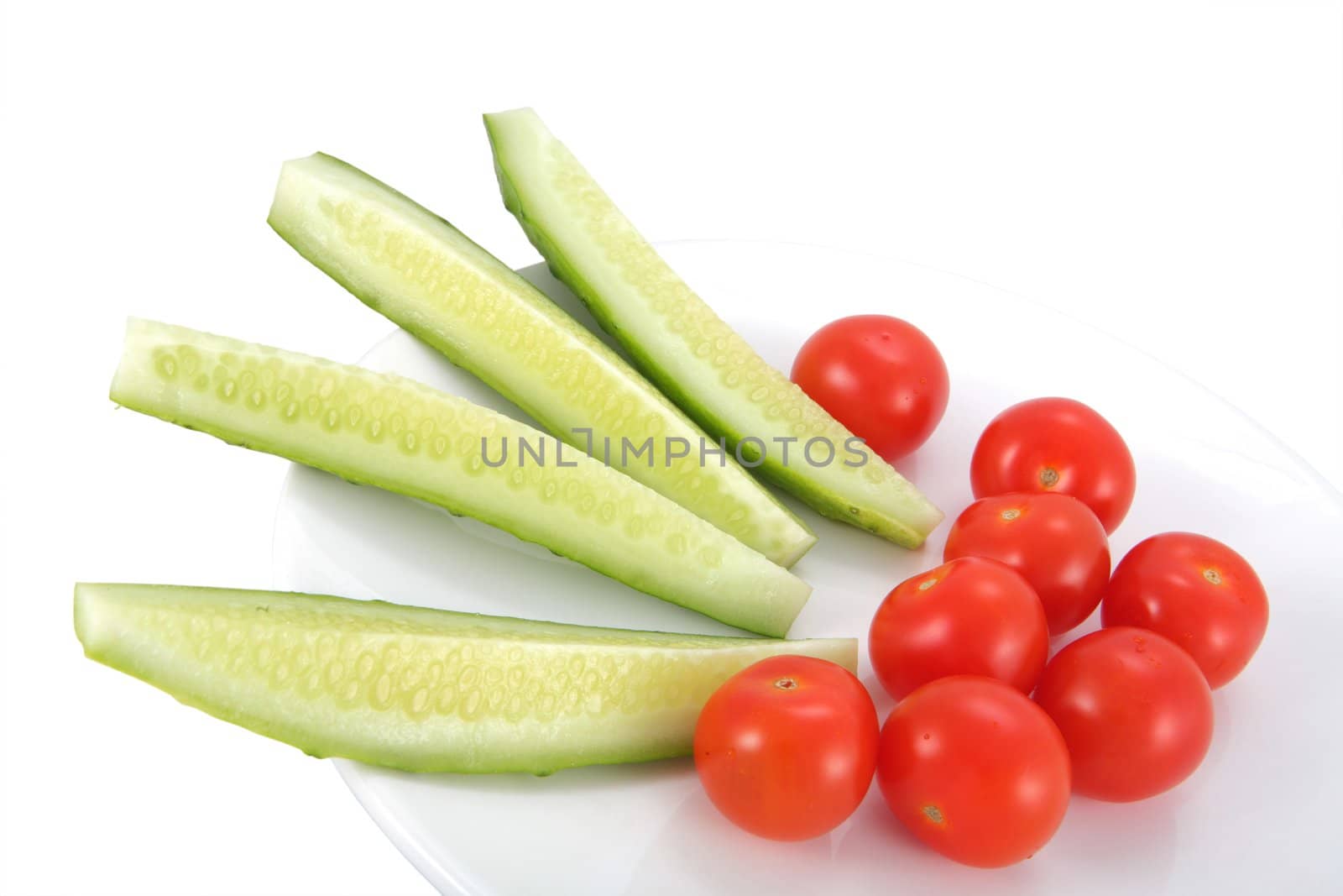 Vegetables, Cucumber and Tomatoes Cherry on White Plate