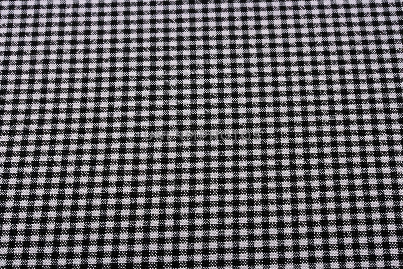 Fabric in a black and white small section as a background.