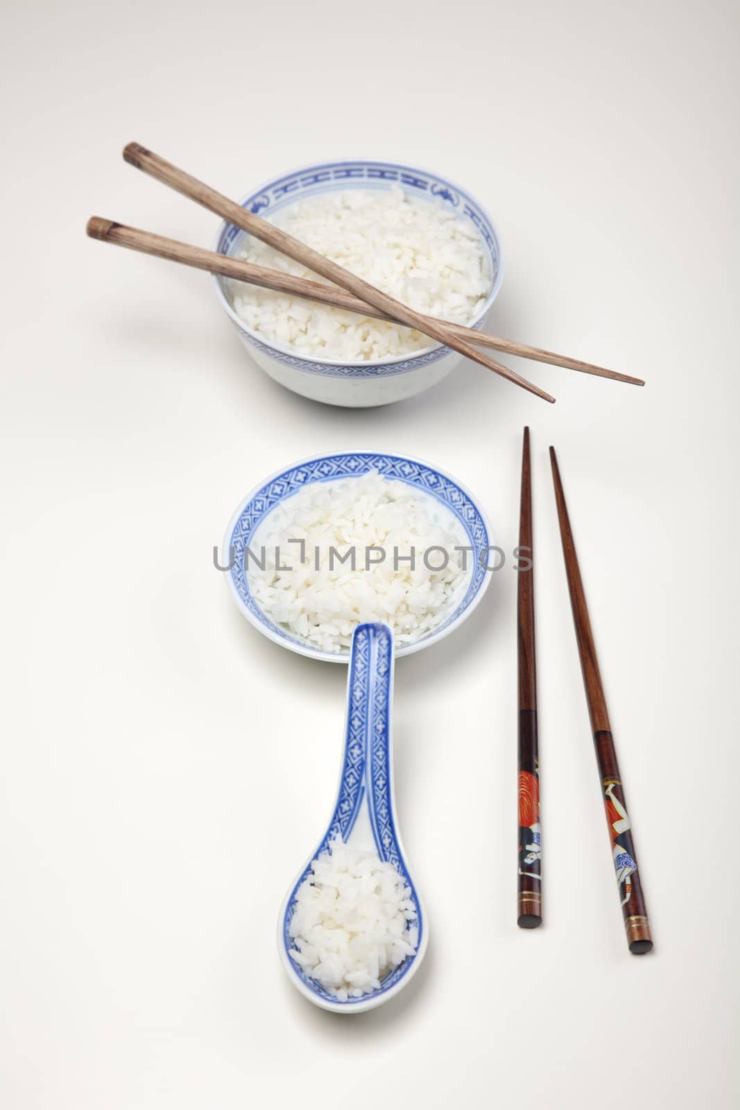 Bowl of white rice isolated on white