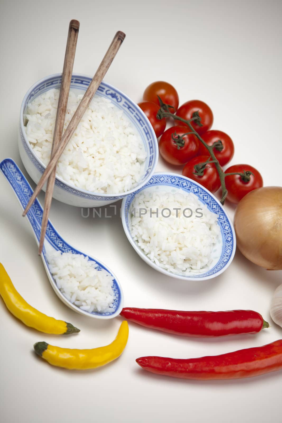 Bowl of white rice isolated on white by shiffti