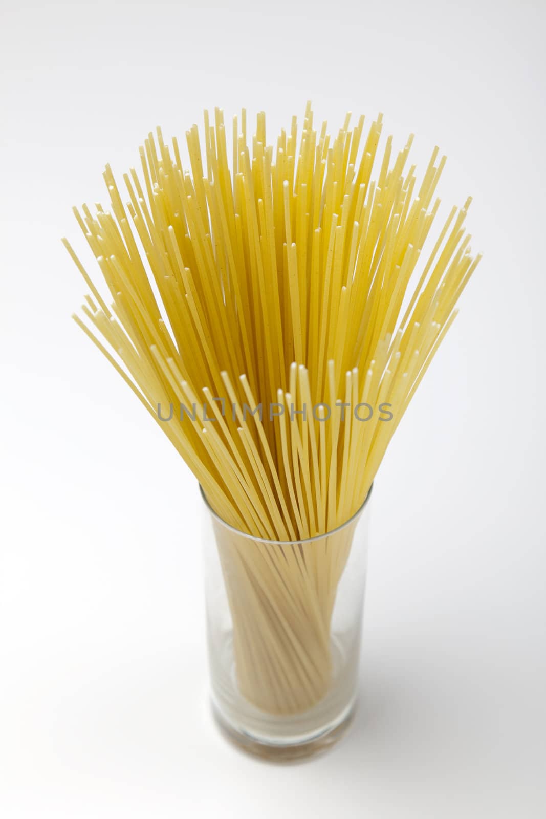 Close up of basic ingredients for italian pasta. All isolated on white.