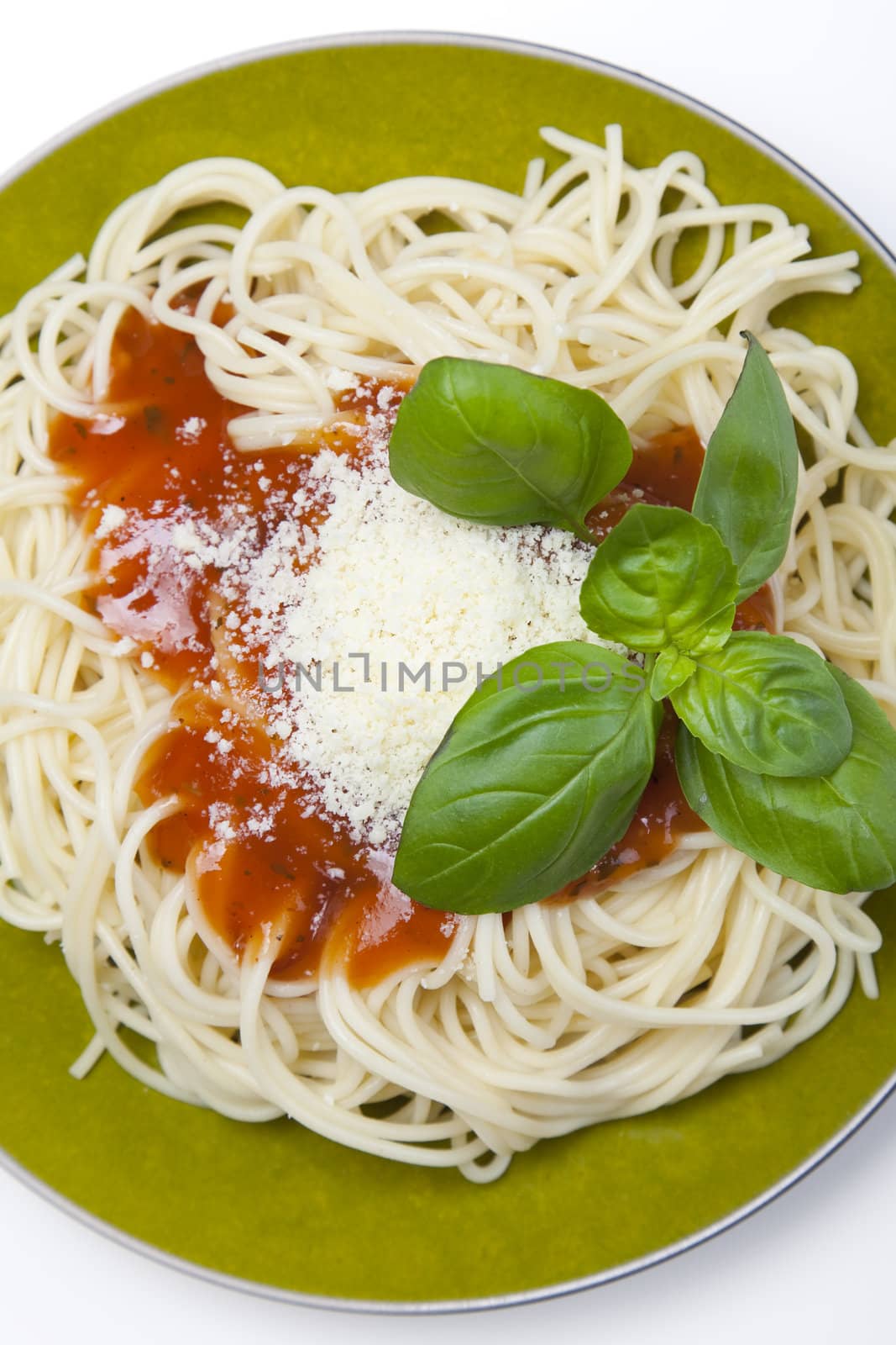 Pasta with tomato sauce basil and grated parmesan