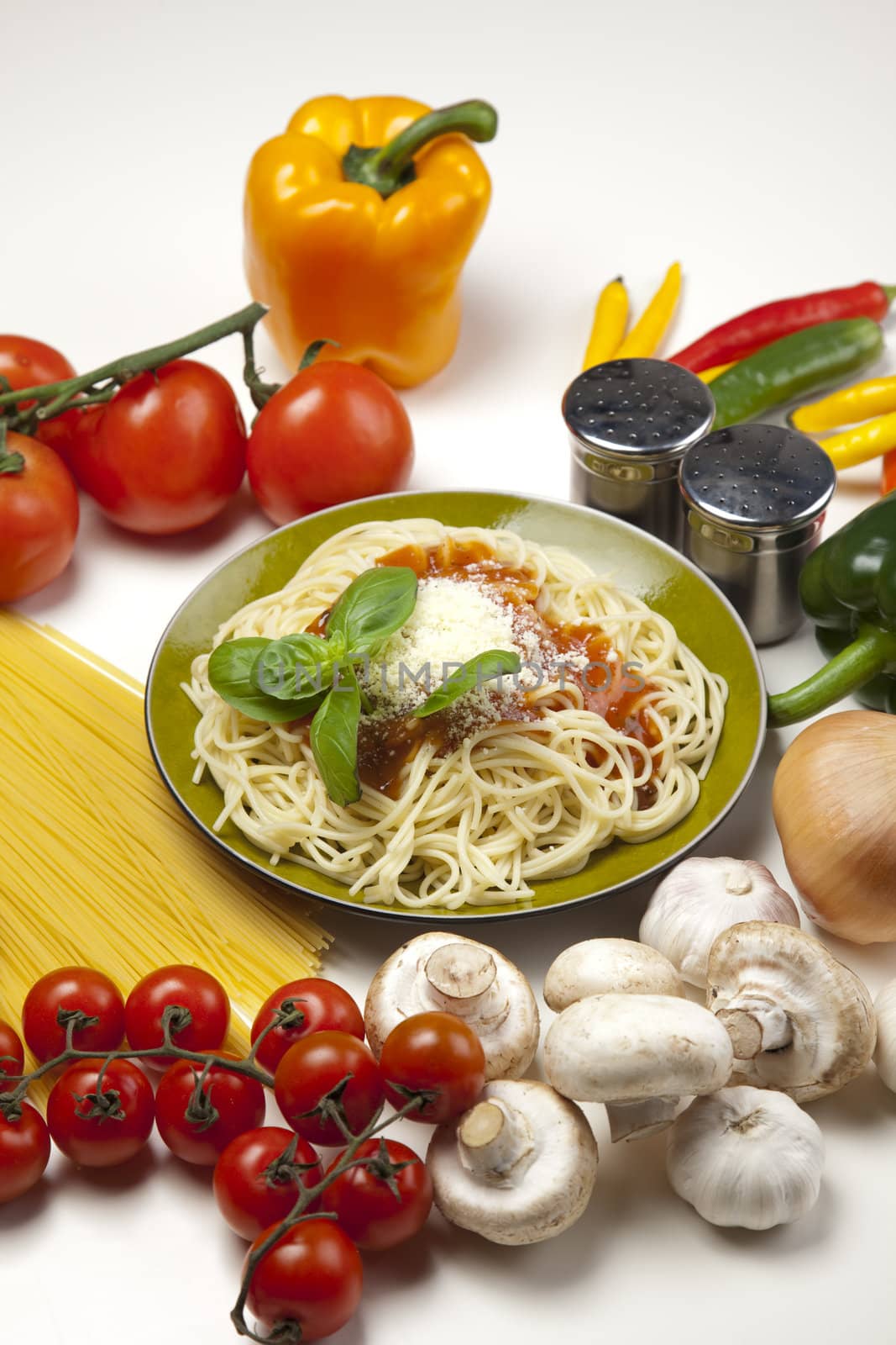 Pasta with tomato sauce basil and grated parmesan