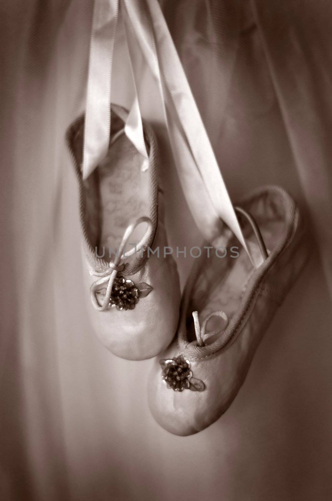 Image of dance or ballet slippers in sepia tone