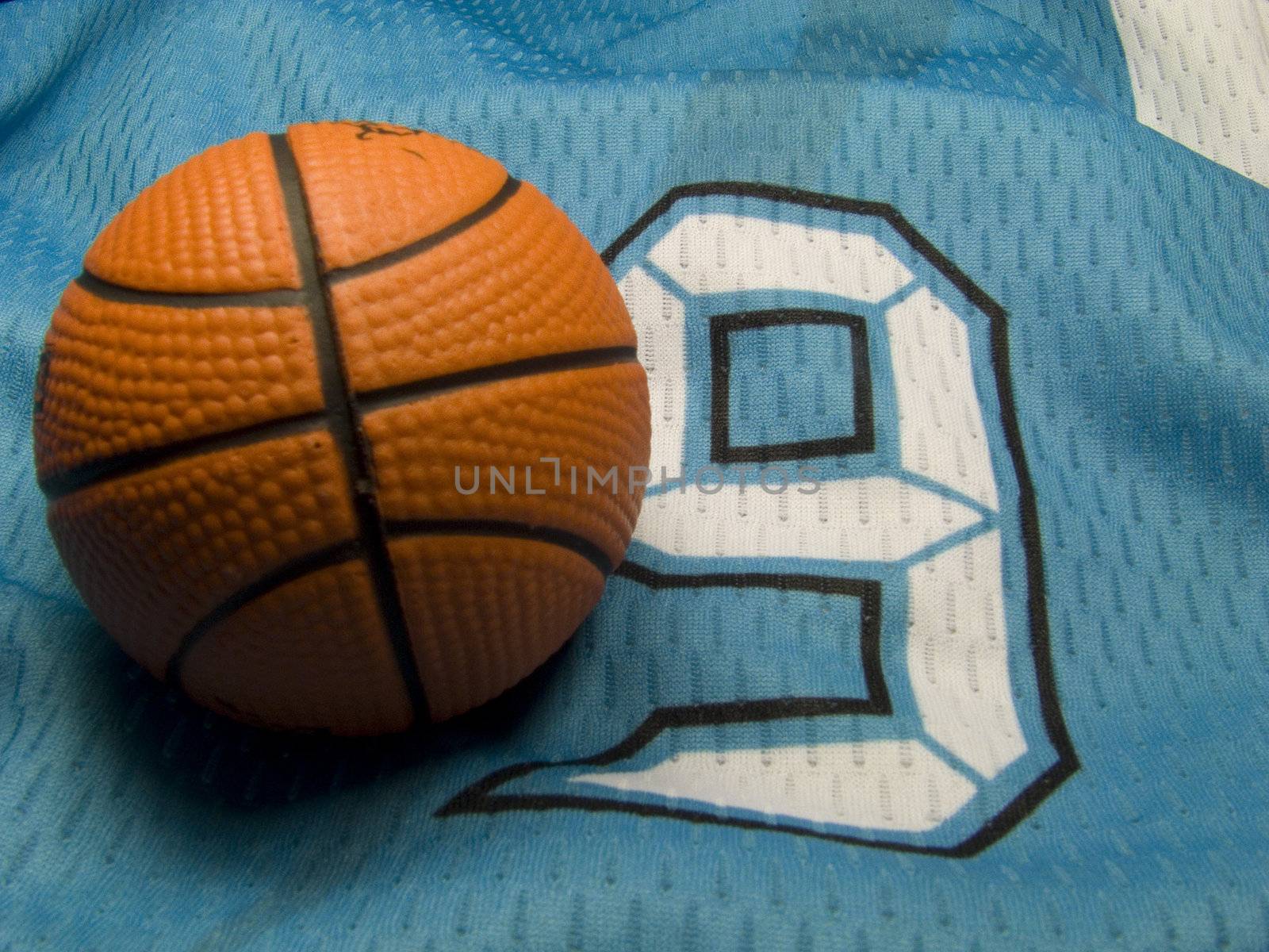 small ball on the number nine uniform