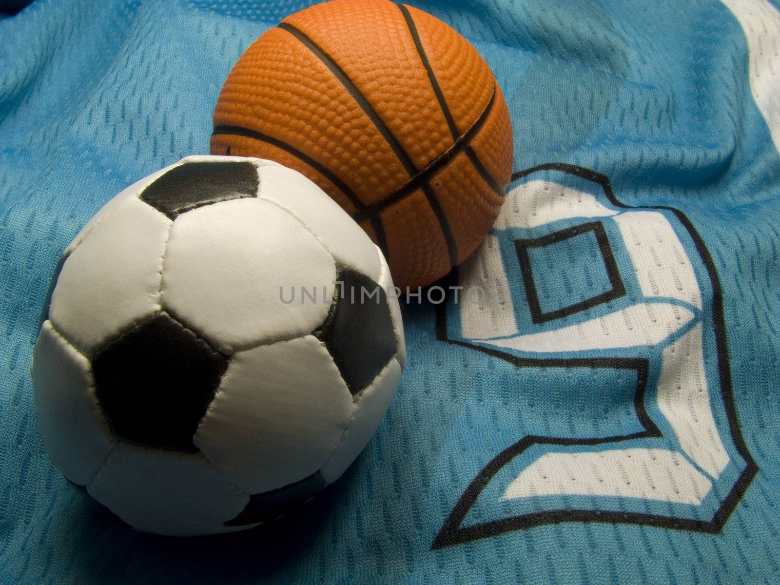 soccer and basketball bals on the number nine uniform