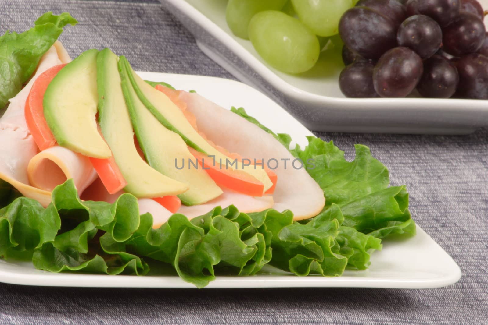 lettuce sandwich and grapes by tacar