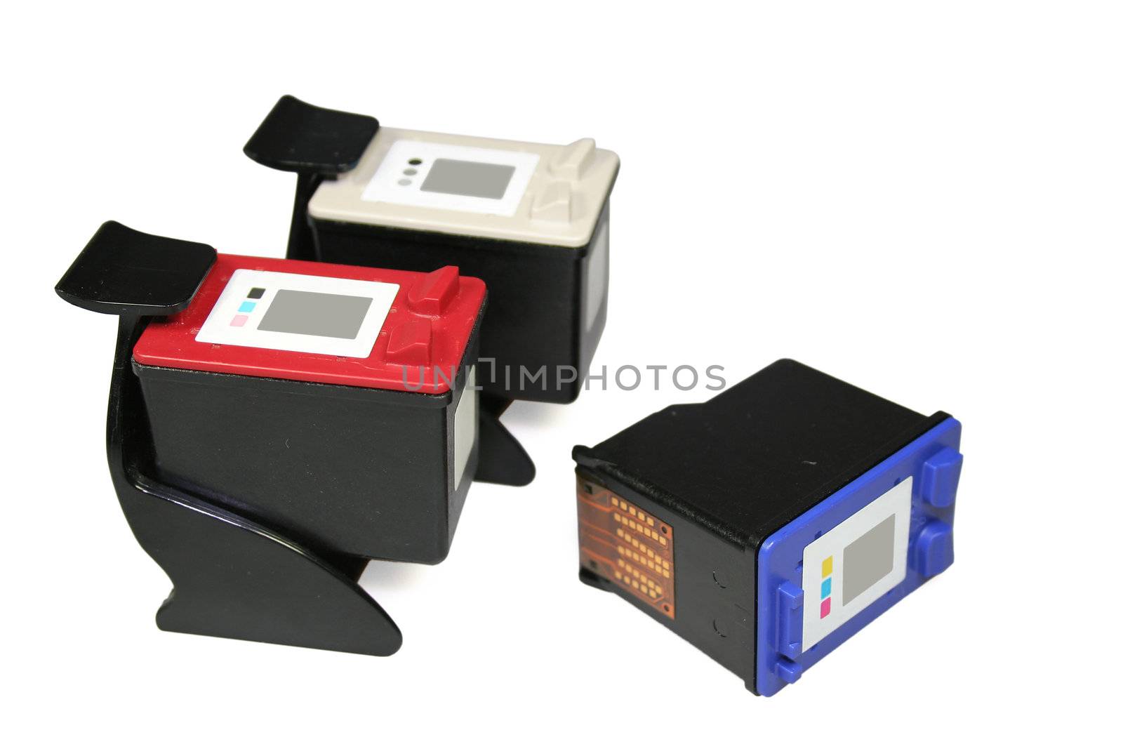 Three different cartridges of an ink printer. Isolated on white.