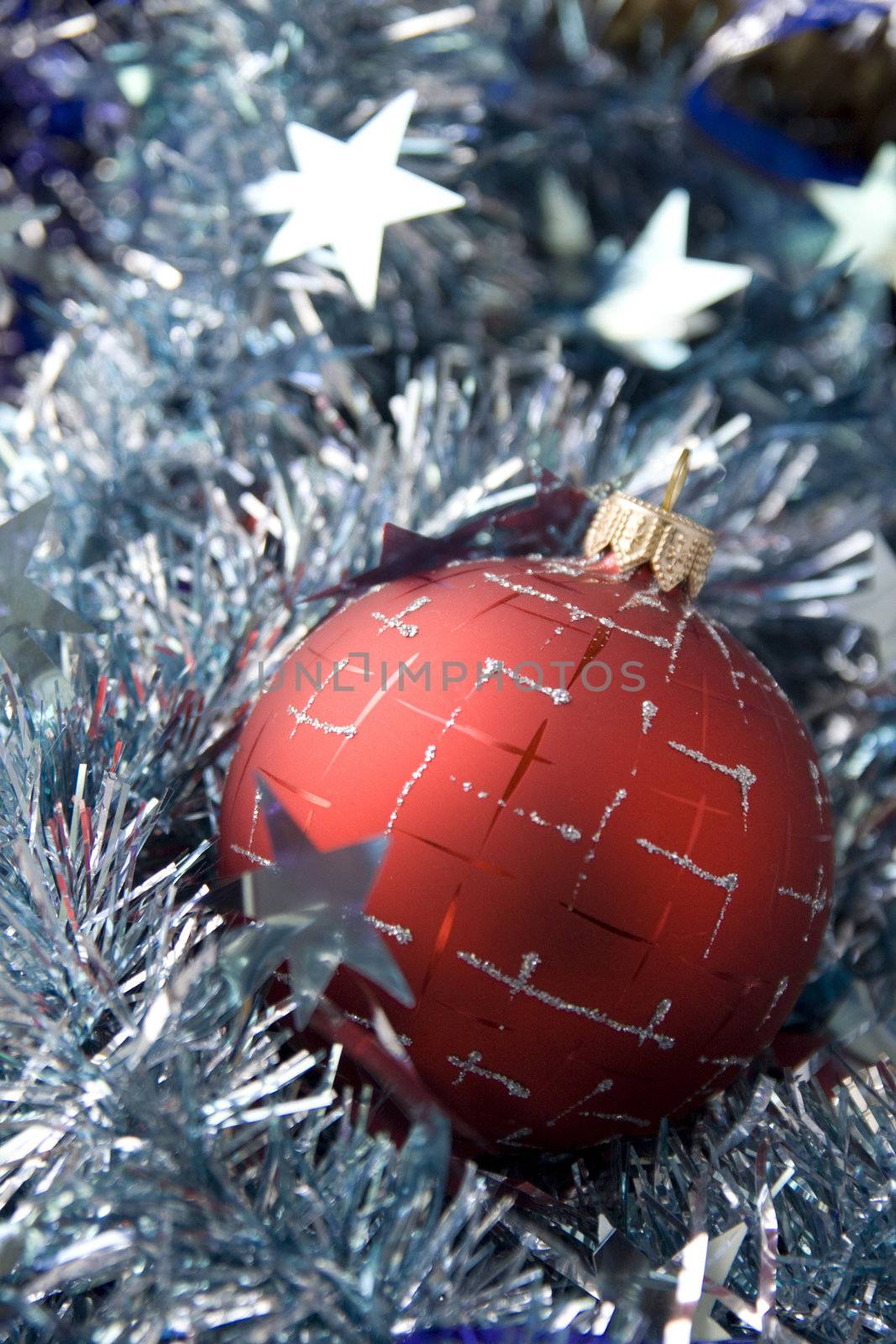 Red christmas balls in to a tinsel