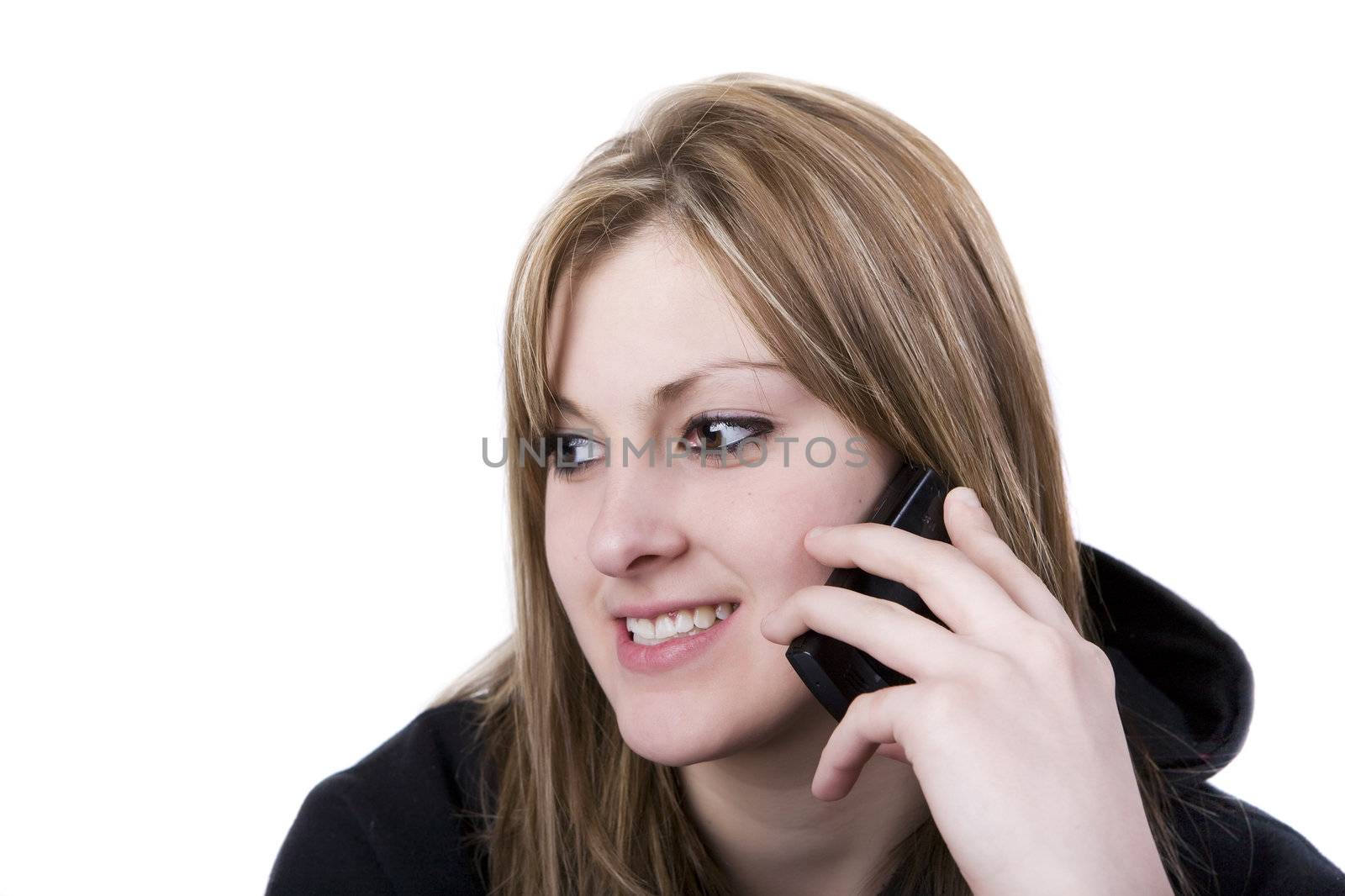 A young female talking on a cellphone