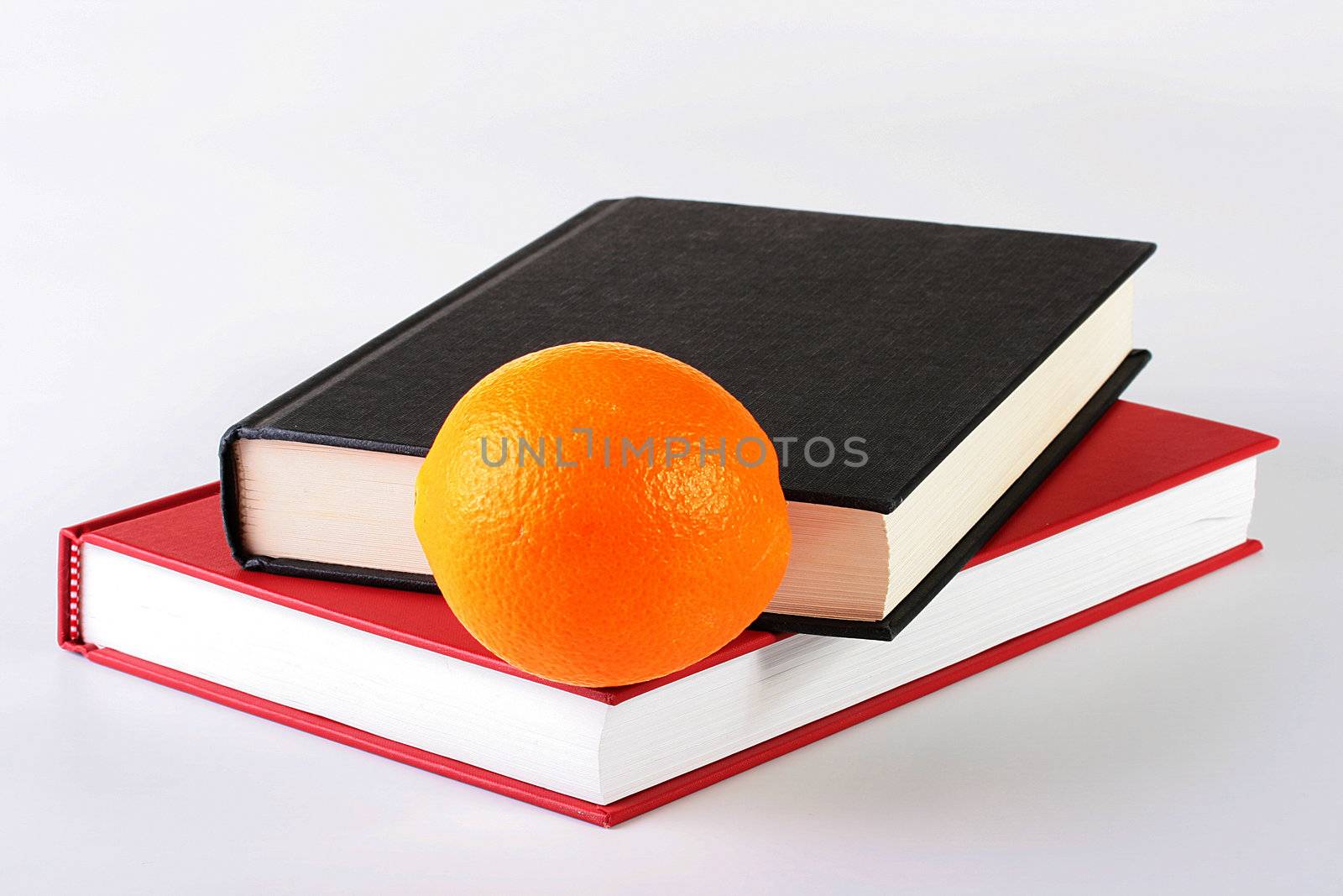 Books and orange by VIPDesignUSA