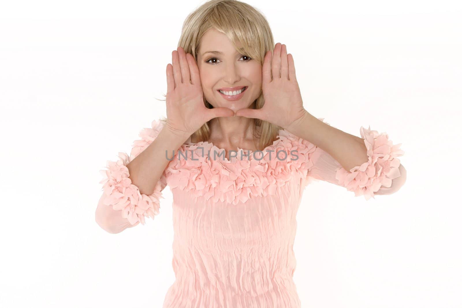 Female with hands together in a face frame