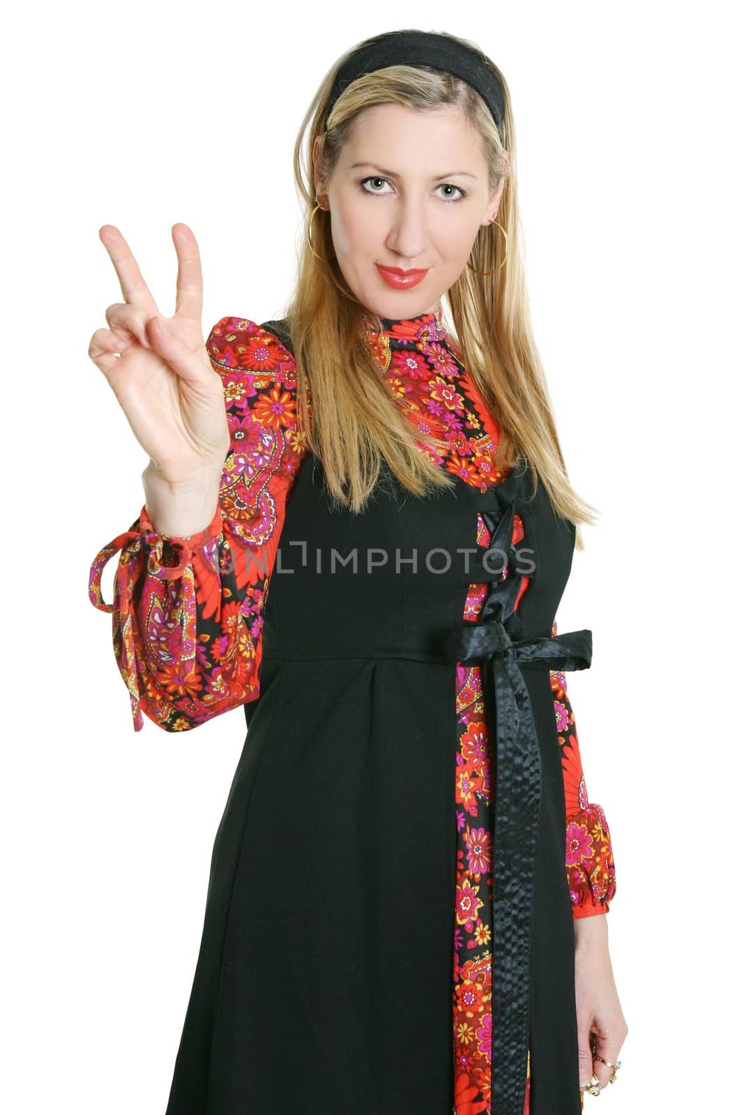 Woman makes a gesture of peace.
