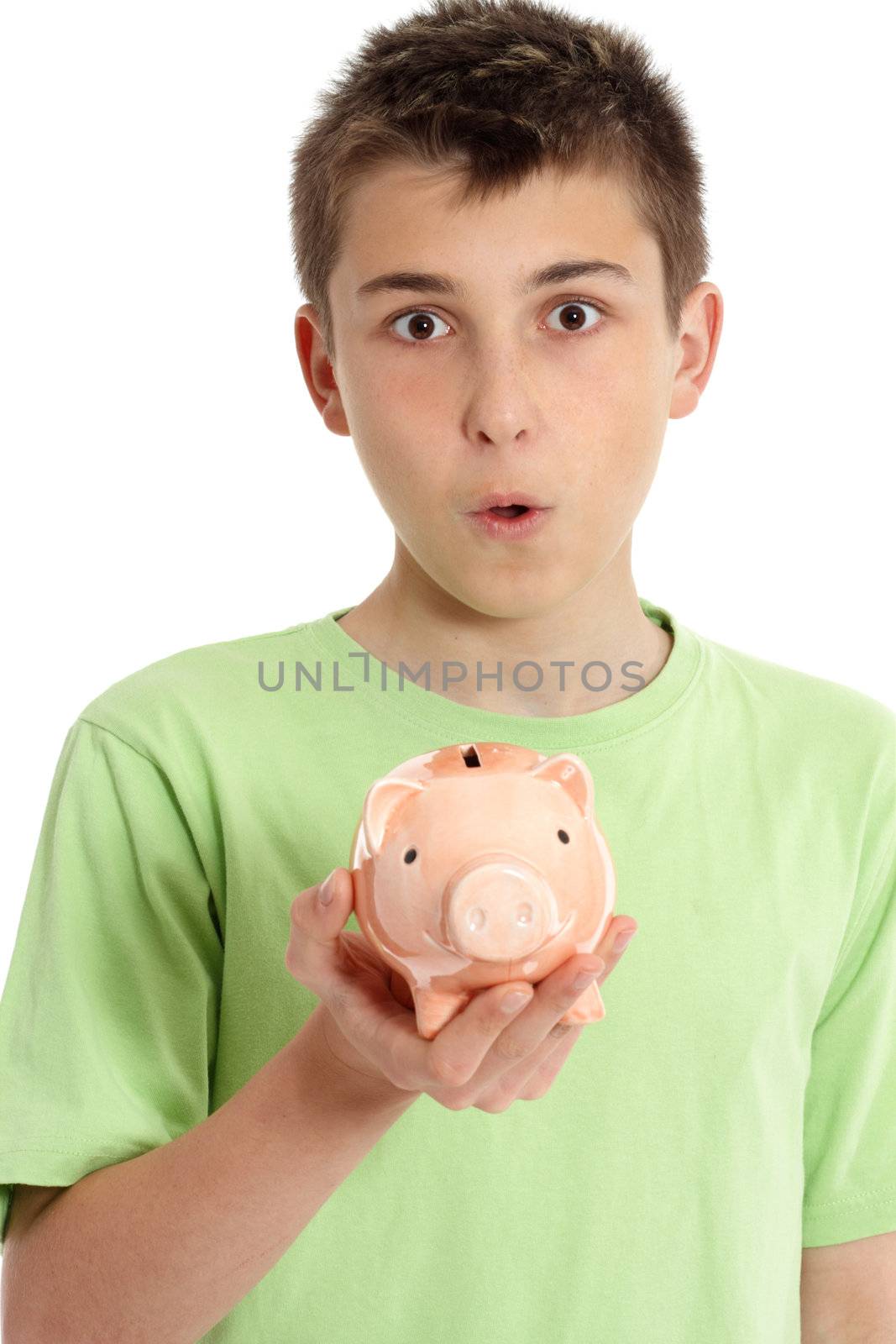 Close cropped shot of a boy with surpirse expression holding a money box.
