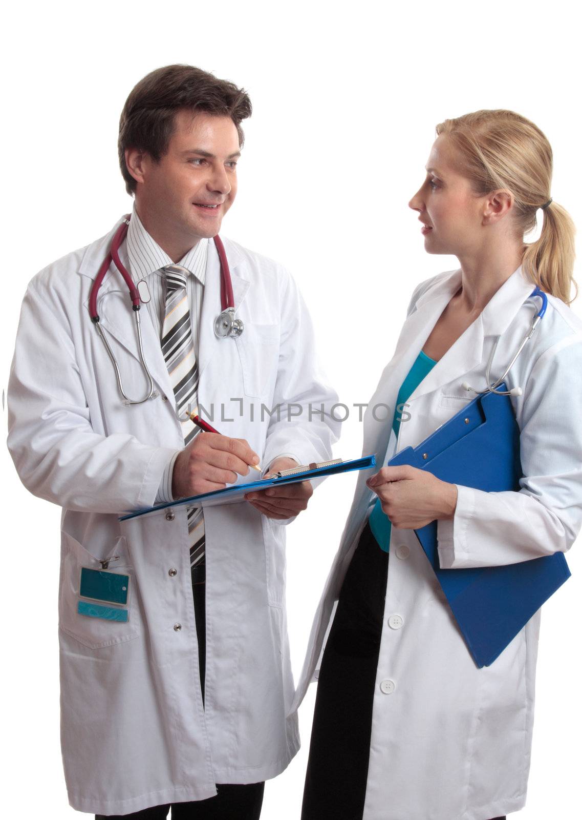 Doctors stand together in friendly discussion