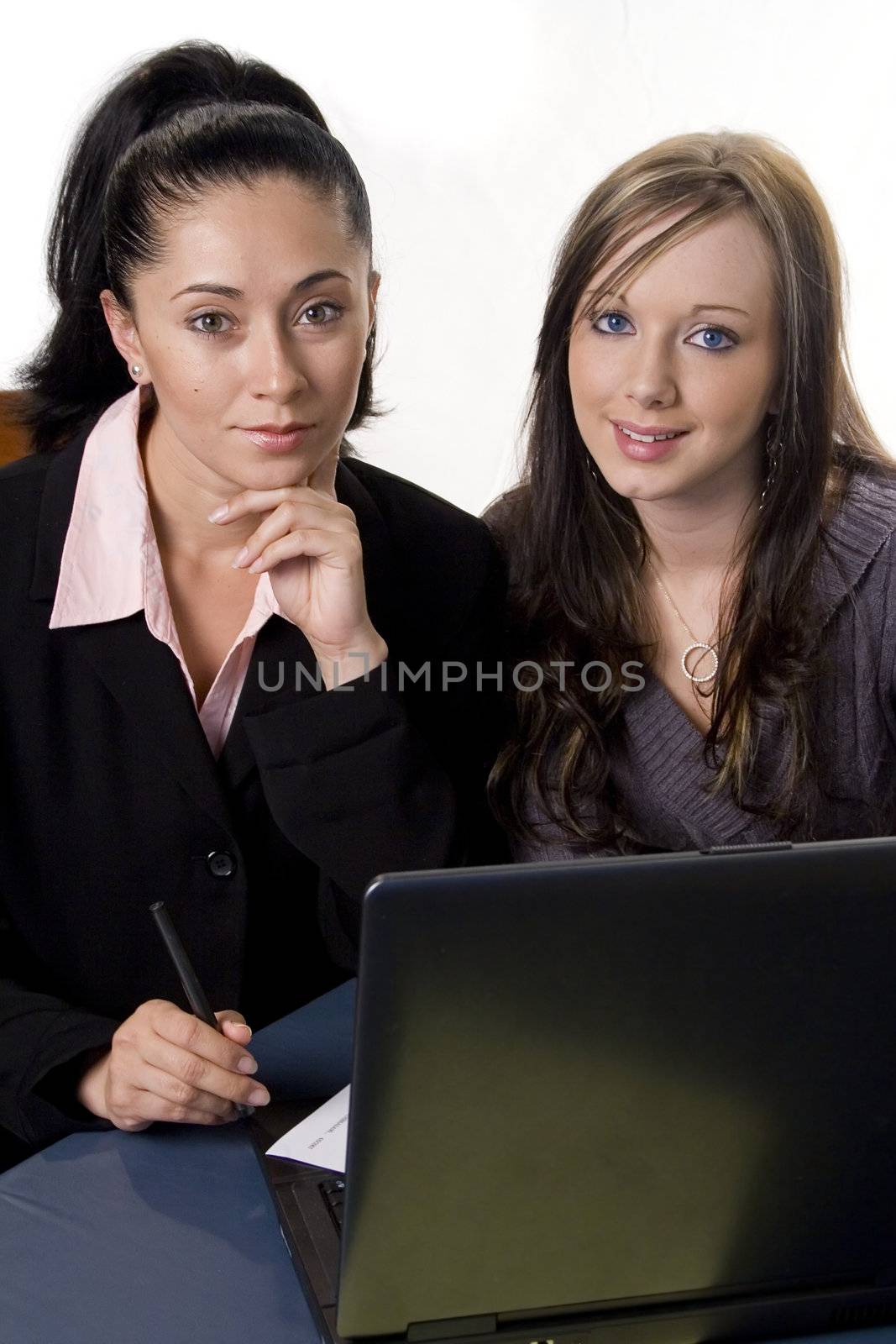 Two business woman with laptop