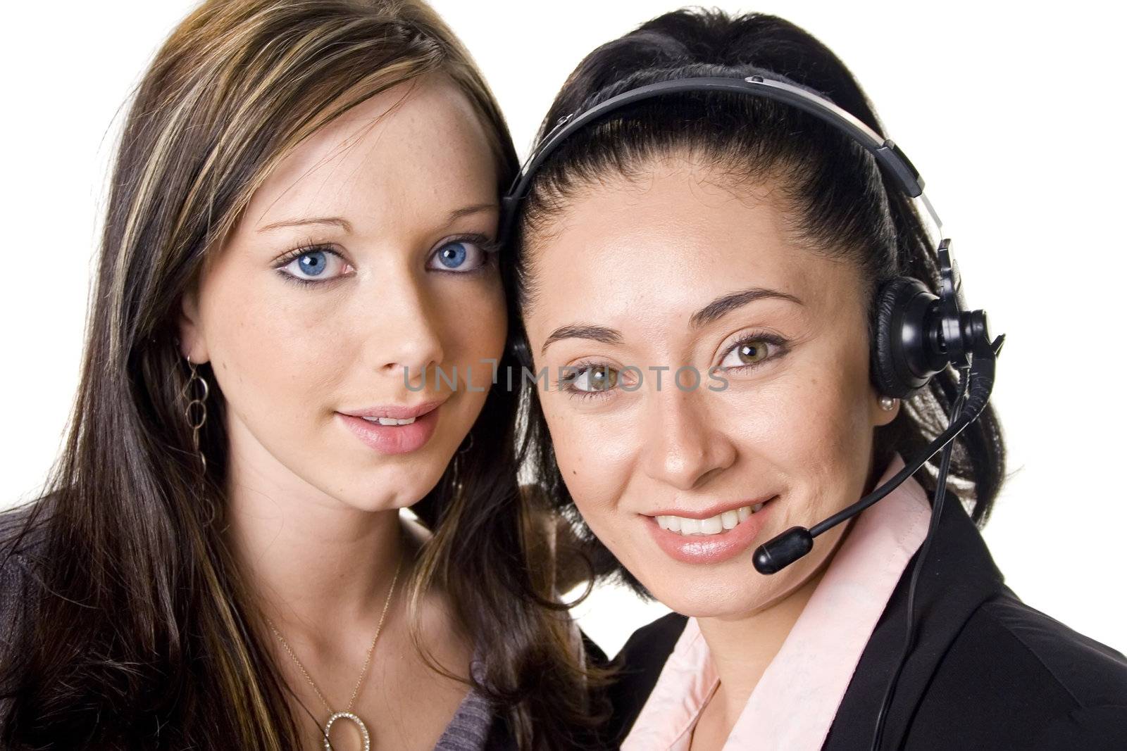 Two business women smiling at camera