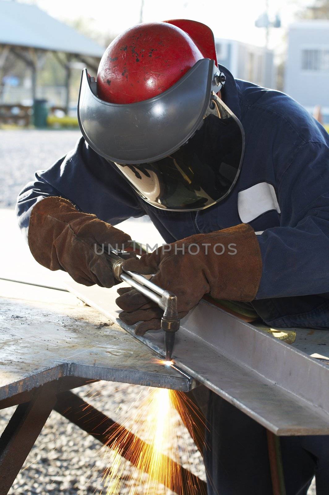 steel worker burning steel