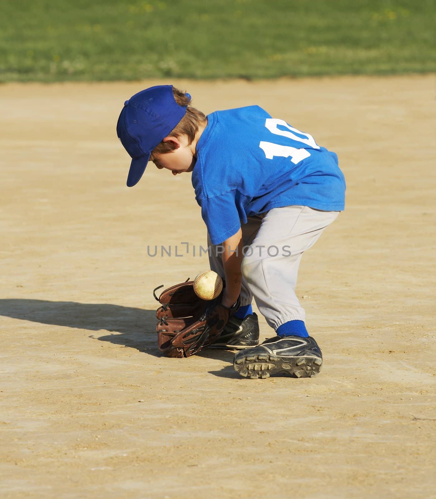 boy playing baseball