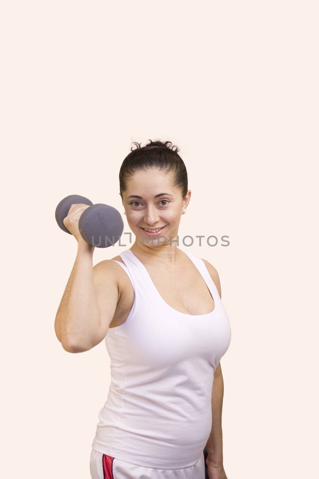 Attractive Hispanic Woman Lifting Weights