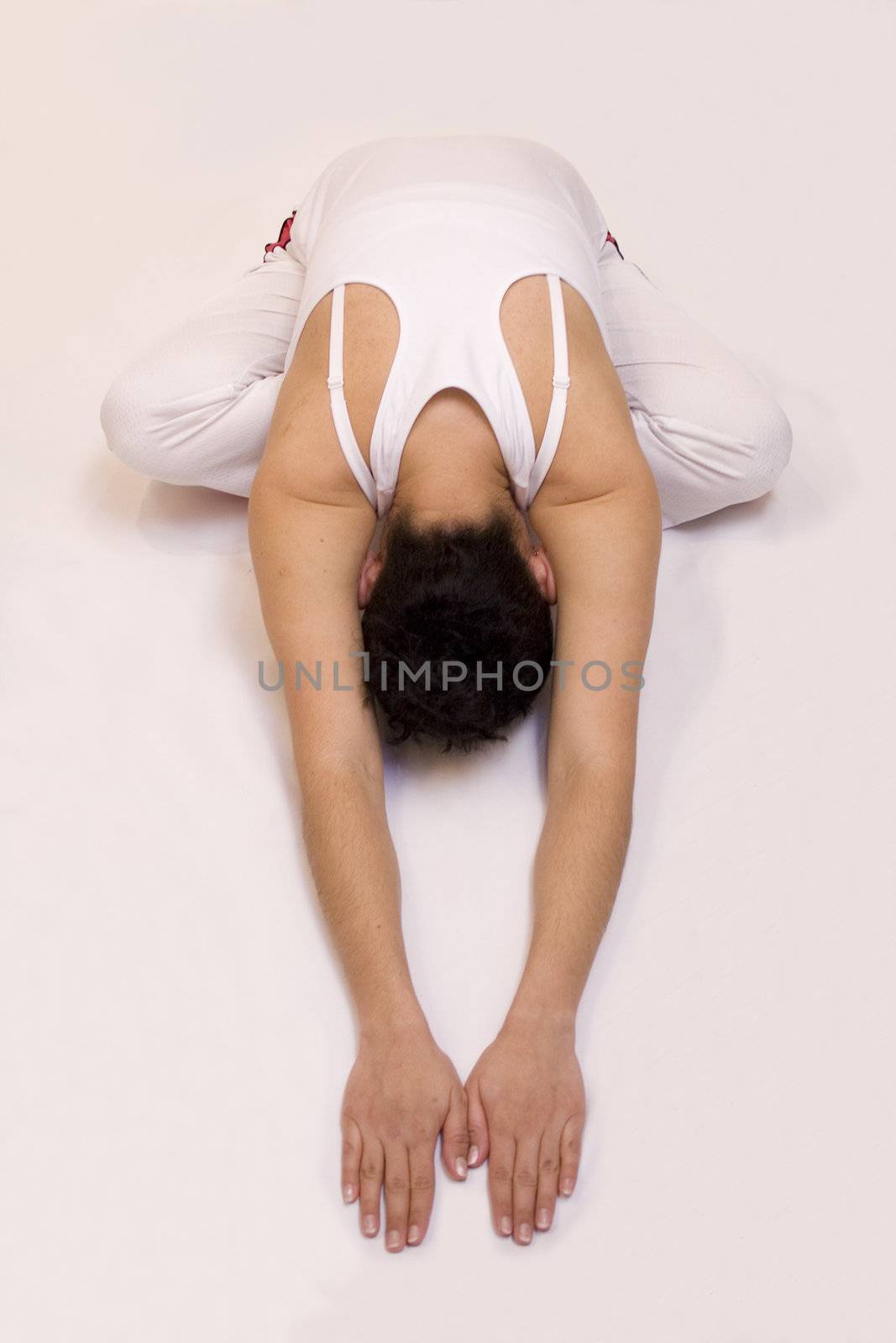 Woman doing yoga isolated on white