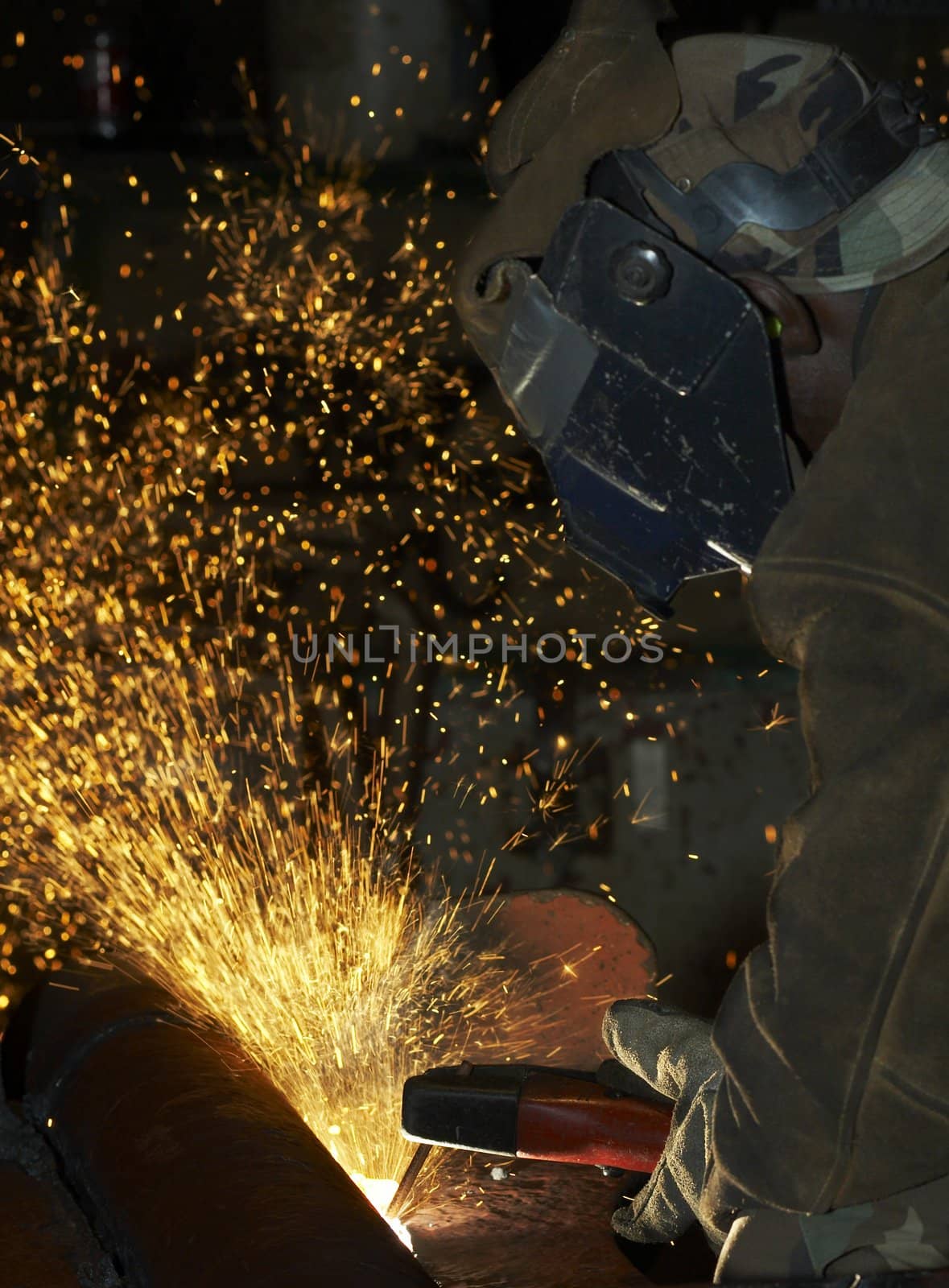 arc welder working at night