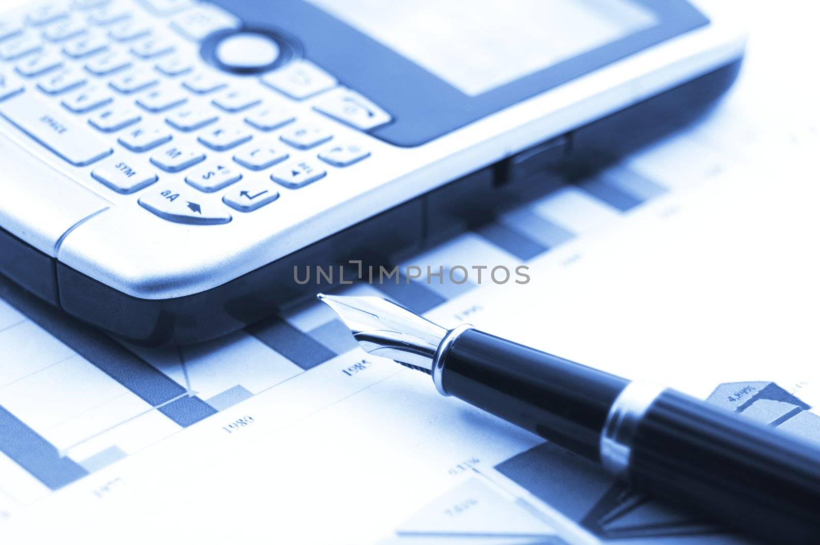 financial stock market success concept with chart and pen
