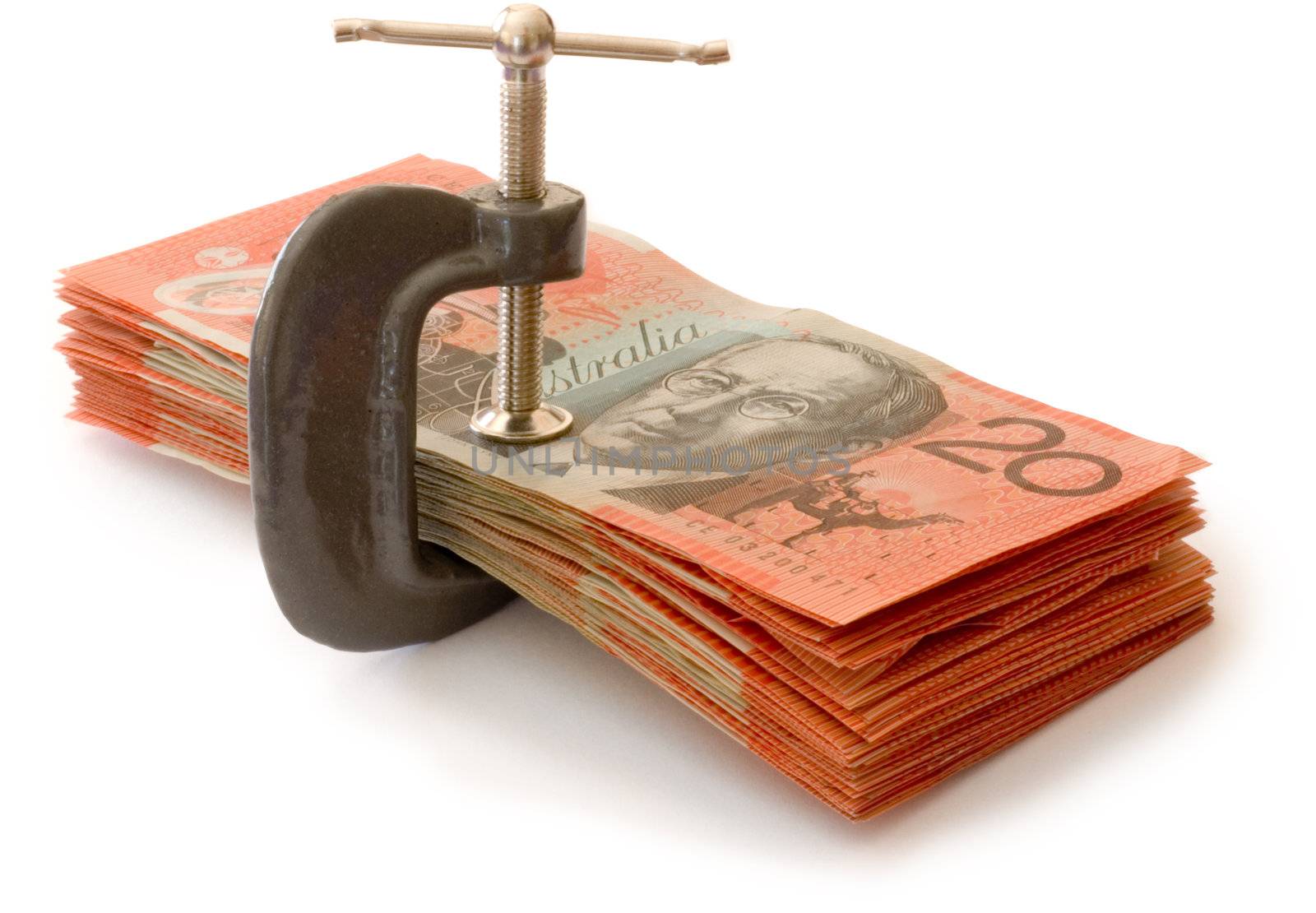 Australian banknotes in a g-clamp, metaphor for restriction on spending