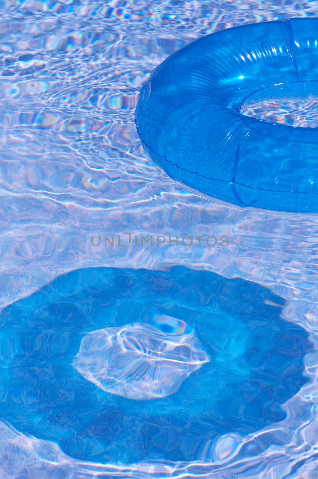 blue floats in pool