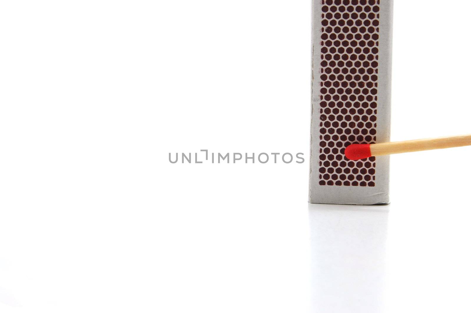 Some red matches isolated on a white background.