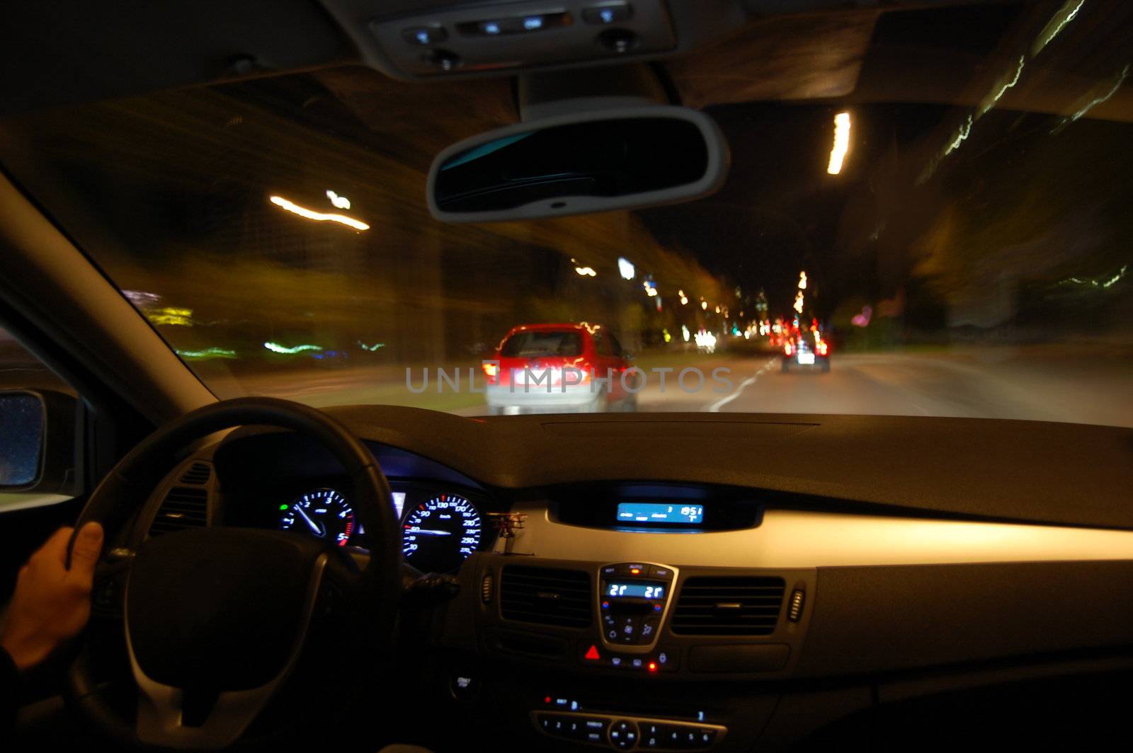 night drive with car in motion through the city shows the speed