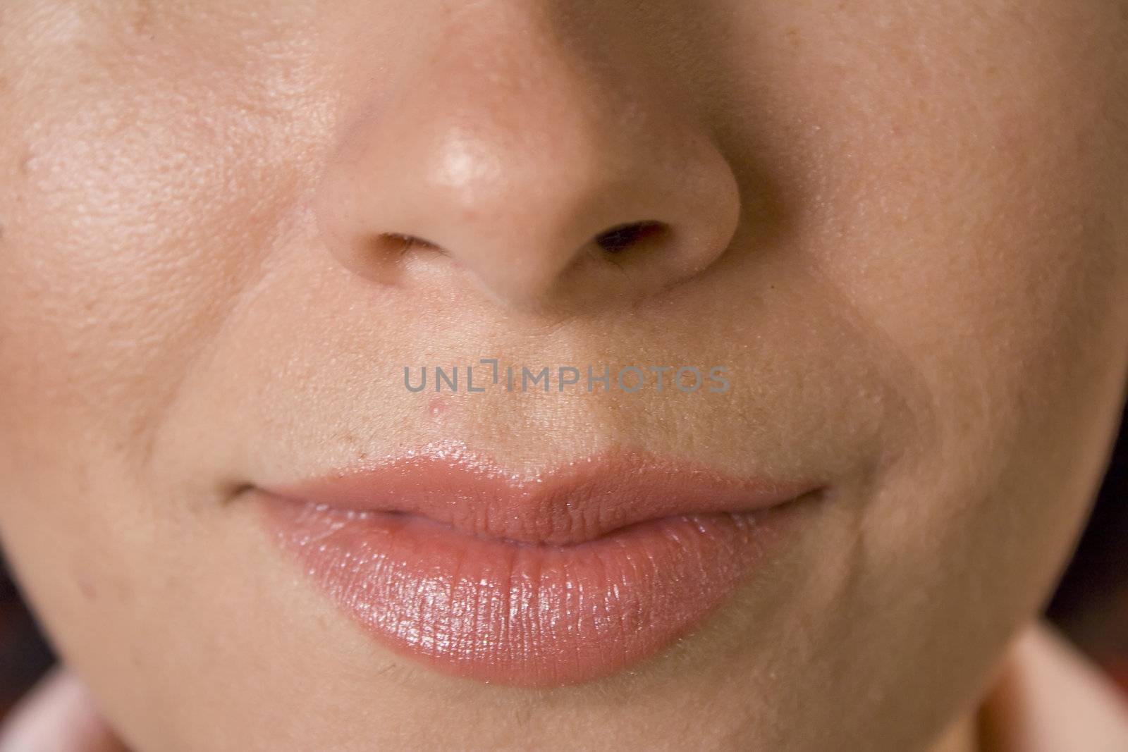 Close up of womans face with lips and nose