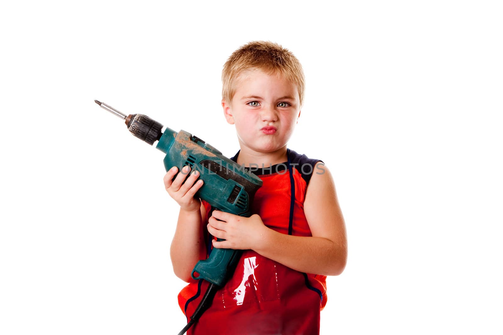 Macho boy child with heavy duty drill and lots of attitude, isolated.